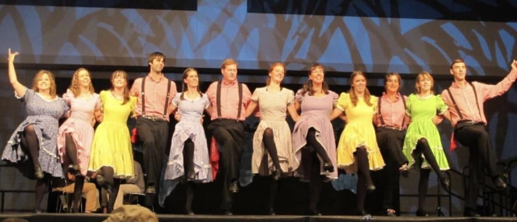 apple chill cloggers dancing on the stage
